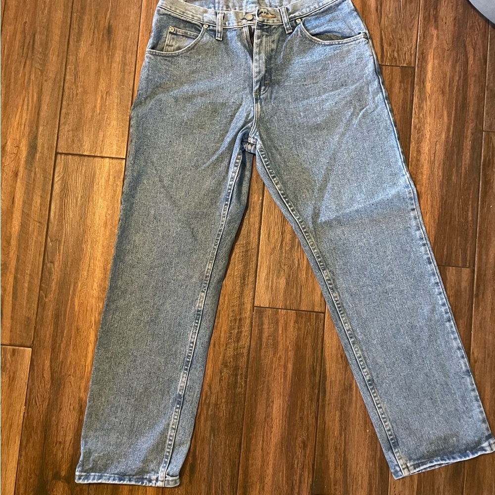 I’m selling a pair of blue light wash Wrangler jeans size 32x30.